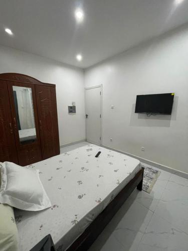 En eller flere senge i et værelse på Single room cozy