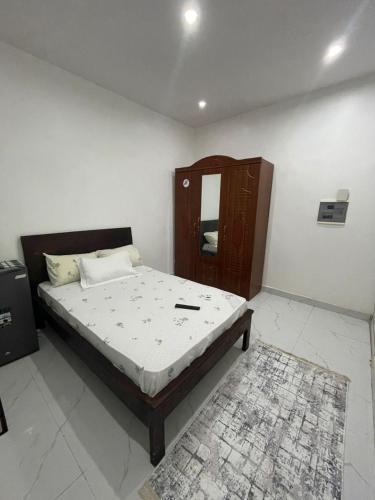 En eller flere senge i et værelse på Single room cozy