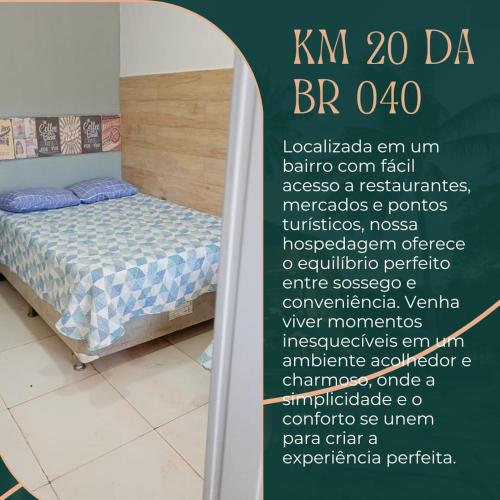 a poster of a bedroom with a bed in a room at Hospedaria Km 20 da Br 040 Luziânia in Luziânia