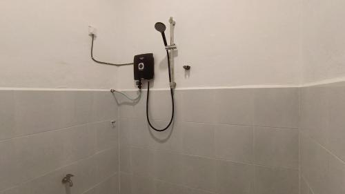 Koupelna v ubytování Homestay Rahmat 2