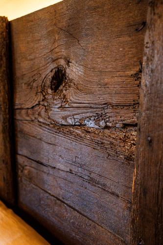 a close up of a piece of wood with a knot in it at Podere Dell'Arco Country Charme in Viterbo