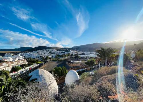 an aerial view of a city with domes at Finca Oaxaca - Casa Tortuga in Agaete