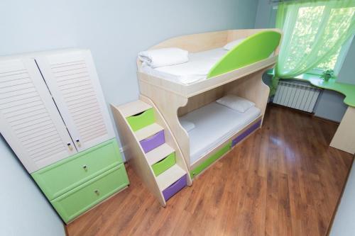 a doll house bedroom with a bunk bed and a closet at Seven Apartments 66 in Vyshneve