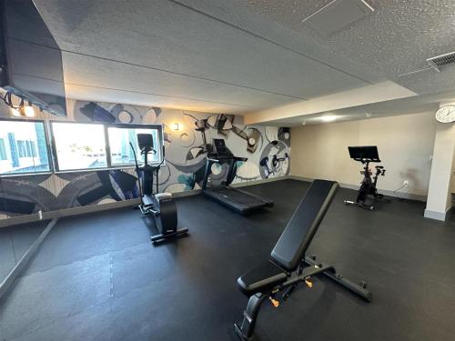 a gym with treadmills and cardio equipment in a room at Best Western Plus Downtown Tacoma in Tacoma