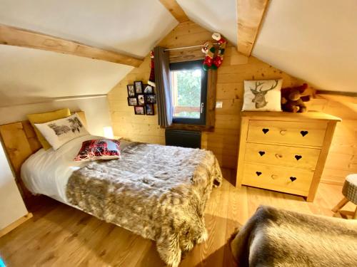 Postel nebo postele na pokoji v ubytování Chalets des Esquits vue panoramique pistes proches à pied