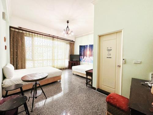 Cama o camas de una habitación en 羽竹民宿 -- 自助方式-附免費停車--