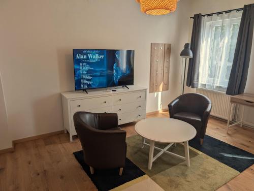 Flataid Apartmenthaus Tieschenにあるテレビまたはエンターテインメントセンター