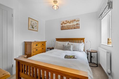 Ένα ή περισσότερα κρεβάτια σε δωμάτιο στο Prestbury Stables