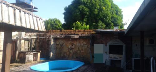 a blue tub sitting outside of a building at Cop 30 in Belém