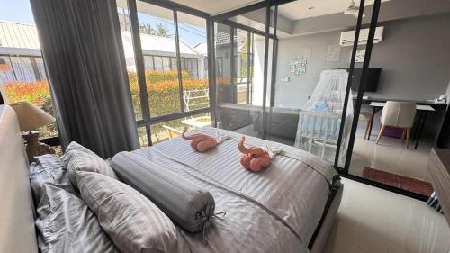 Postel nebo postele na pokoji v ubytování Larnthong Villa Fisherman Bophut Kohsamui