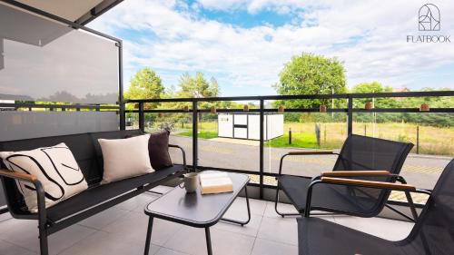 Posezení v ubytování Jantar Resort Flatbook - Wynajem Apartamentów nad Morzem