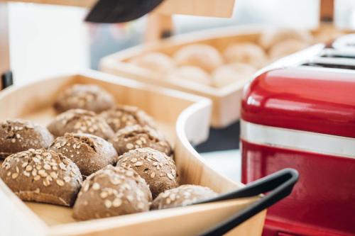 a box of muffins sitting on top of a table at Stay Hotel Faro Centro in Faro