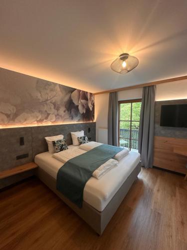 Postel nebo postele na pokoji v ubytování Das Metzgerbräu - Hotel & Brauereigasthof