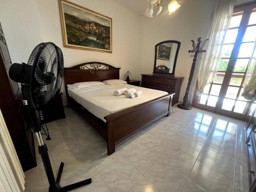 Кровать или кровати в номере Casa Viola - San Remo
