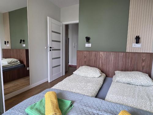 Postel nebo postele na pokoji v ubytování Urban Jungle Apartment ALLEN