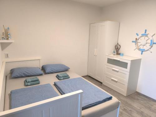 Postel nebo postele na pokoji v ubytování Apartment Eva