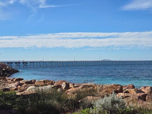 a long pier in the middle of the ocean at Esperance Ocean Escape in Esperance