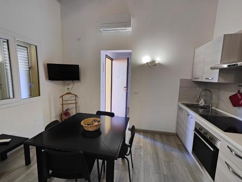 Kuchyň nebo kuchyňský kout v ubytování Casa GRAZIA