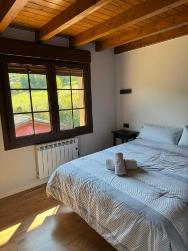 Ένα ή περισσότερα κρεβάτια σε δωμάτιο στο Casa La Escollera