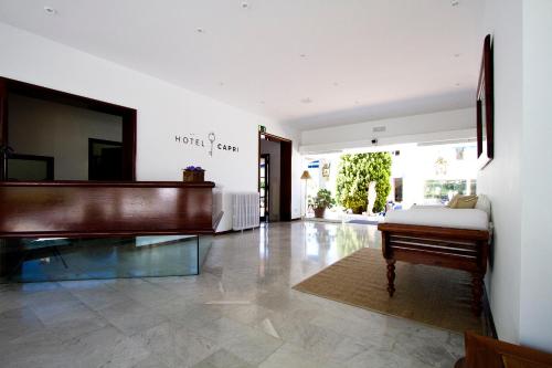 
The lobby or reception area at Hotel Capri
