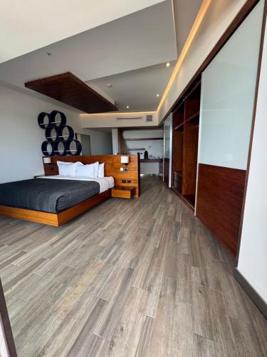 Χώρος καθιστικού στο Sonata Hotel Puebla Angelópolis Distrito Sonata