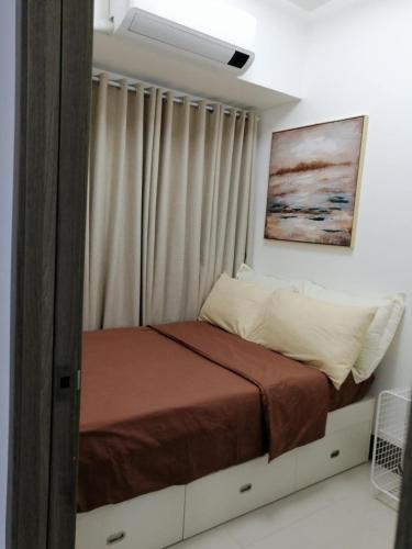 Postel nebo postele na pokoji v ubytování Vistaro Stays at Fame Residences