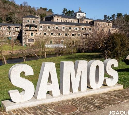 a large sign in front of a large building at Casa Licerio in Samos