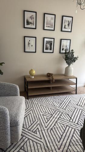 a living room with a couch and a table at Lovely Provo Oasis in Provo