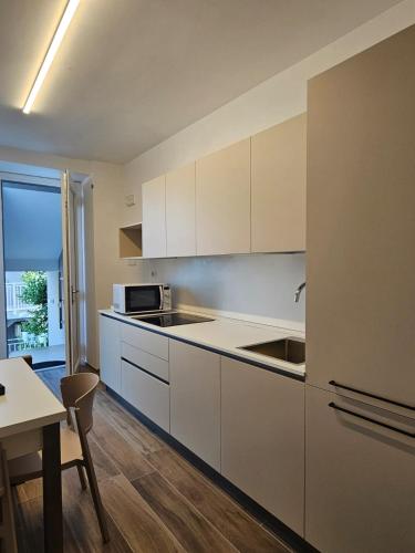 Η κουζίνα ή μικρή κουζίνα στο NORA Apartment 2
