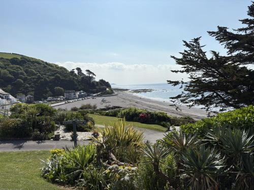 a view of a beach from a hill at Trevian - Mount Brioni in Downderry