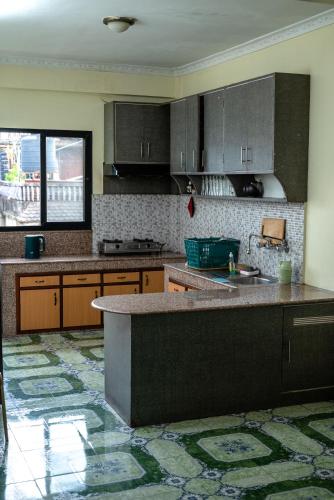 ครัวหรือมุมครัวของ Dasko Shared Serviced Apartment