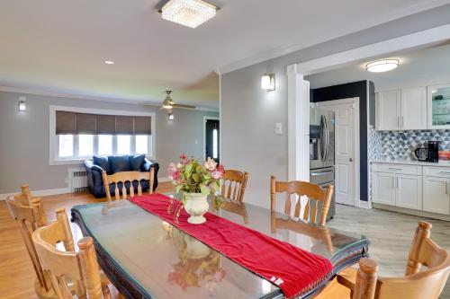 a kitchen and dining room with a table and chairs at 5 Mi to Dtwn Newark Hillside Vacation Rental in Hillside