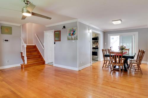 a dining room and living room with a table and chairs at 5 Mi to Dtwn Newark Hillside Vacation Rental in Hillside