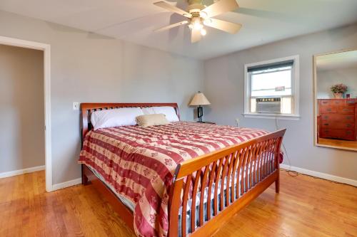 a bedroom with a bed and a ceiling fan at 5 Mi to Dtwn Newark Hillside Vacation Rental in Hillside
