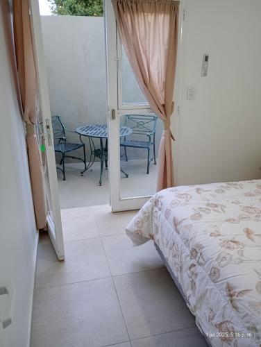Ένα ή περισσότερα κρεβάτια σε δωμάτιο στο Concepcion Termal a 120 mts de Termas