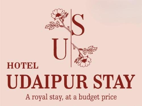 a sign that reads hotel ukip stay a royal stay at a budget price at Hotel Udaipur Stay at Prime Location in Udaipur