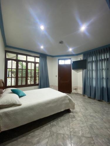 Ένα ή περισσότερα κρεβάτια σε δωμάτιο στο Casa María Bonita