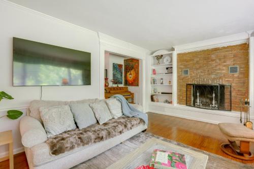 a living room with a couch and a fireplace at Walk to Restaurants New Hope Home with Deck and Yard! in New Hope