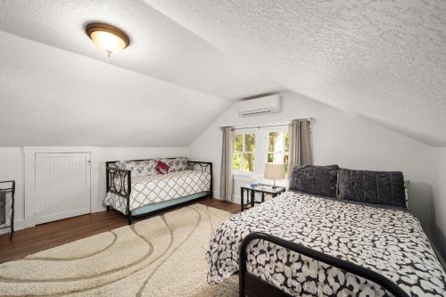 a bedroom with a bed and a window at Southern Porch Life in Ocala