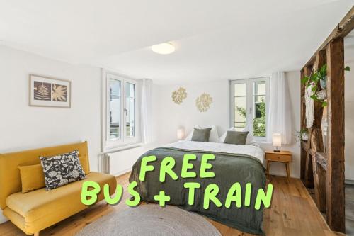 a bedroom with a bed with a free buys train sign on it at Klara 1014 - Olma, Spital, Uni St- Gallen in St. Gallen