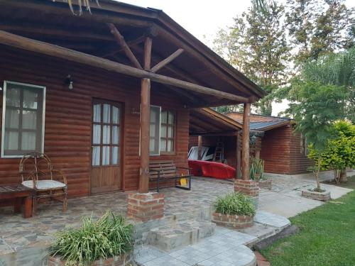 Κήπος έξω από το Complejo de Cabañas Las Ranas