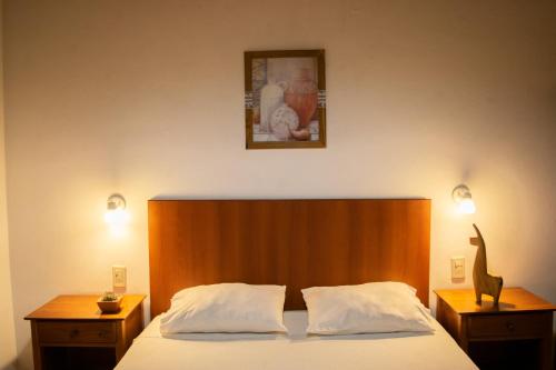 Ένα ή περισσότερα κρεβάτια σε δωμάτιο στο Hotel Cafayate
