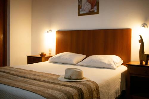 Ένα ή περισσότερα κρεβάτια σε δωμάτιο στο Hotel Cafayate
