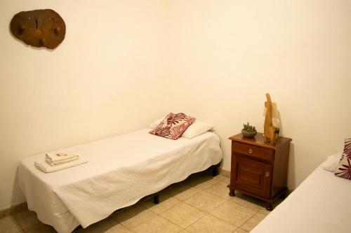 Ένα ή περισσότερα κρεβάτια σε δωμάτιο στο Hotel Cafayate