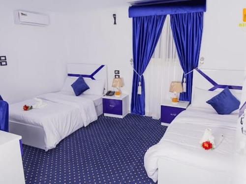 Ένα ή περισσότερα κρεβάτια σε δωμάτιο στο Istanbul HOTEL Minya