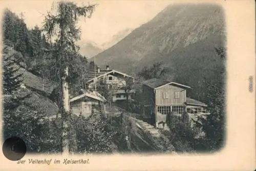 an old photo of a village on a mountain at Veitenhof im Kaisertal, nur nach 30 minütigem Spaziergang erreichbar, only after 30 minutes walk reachable in Ebbs