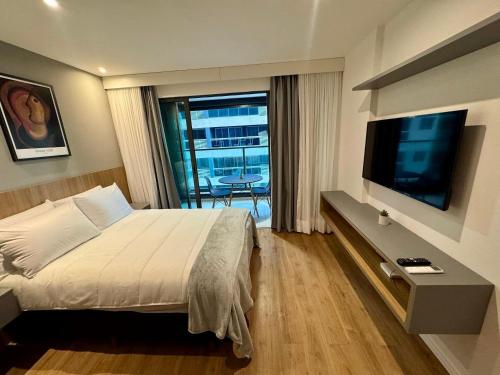TV/trung tâm giải trí tại UNU Art Studio Armação: piscina, academia, e +