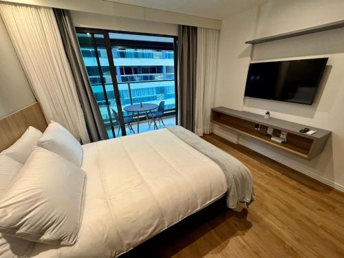TV/trung tâm giải trí tại UNU Art Studio Armação: piscina, academia, e +