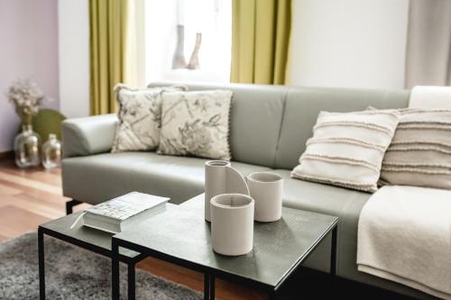 a living room with a couch and a coffee table at My Wonderland in Salzburg