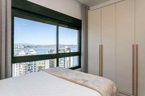 Giường trong phòng chung tại Vista Mar | Piscina no Rooftop | WI-FI 300mb #CA80